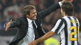 Andrea Pirlo and Antonio Conte during the Serie A match between Juventus FC and AC Milan on October 2, 2011 in Turin, Italy.