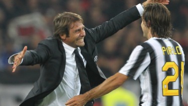 Andrea Pirlo and Antonio Conte during the Serie A match between Juventus FC and AC Milan on October 2, 2011 in Turin, Italy.